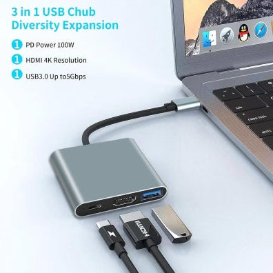 3-in-1 USB hub with laptop and cables on a light background